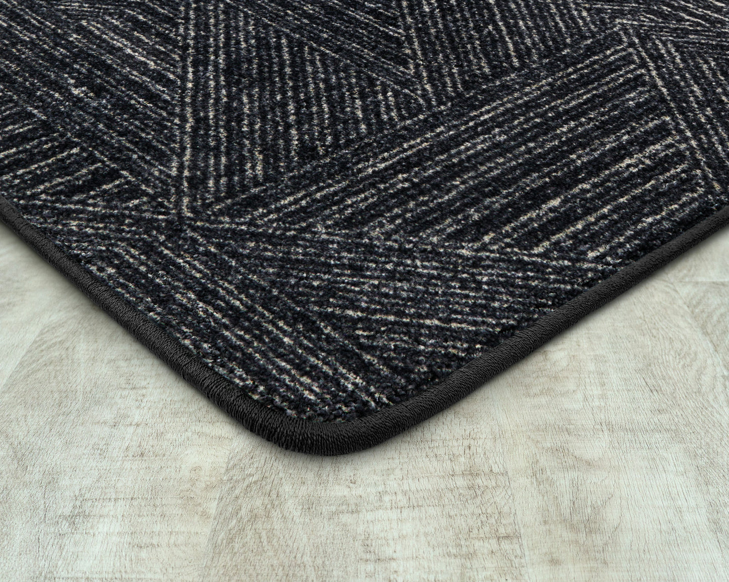 Above Board 5'4" x 7'8" area rug in color Onyx