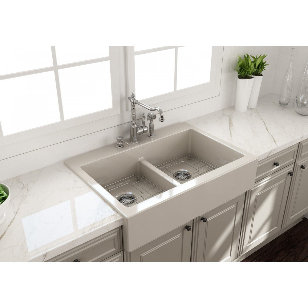 Nuova Apron Front Drop-In Fireclay 34 in. 50/50 Double Bowl Kitchen Sink with Protective Bottom Grids and Strainers in Biscuit