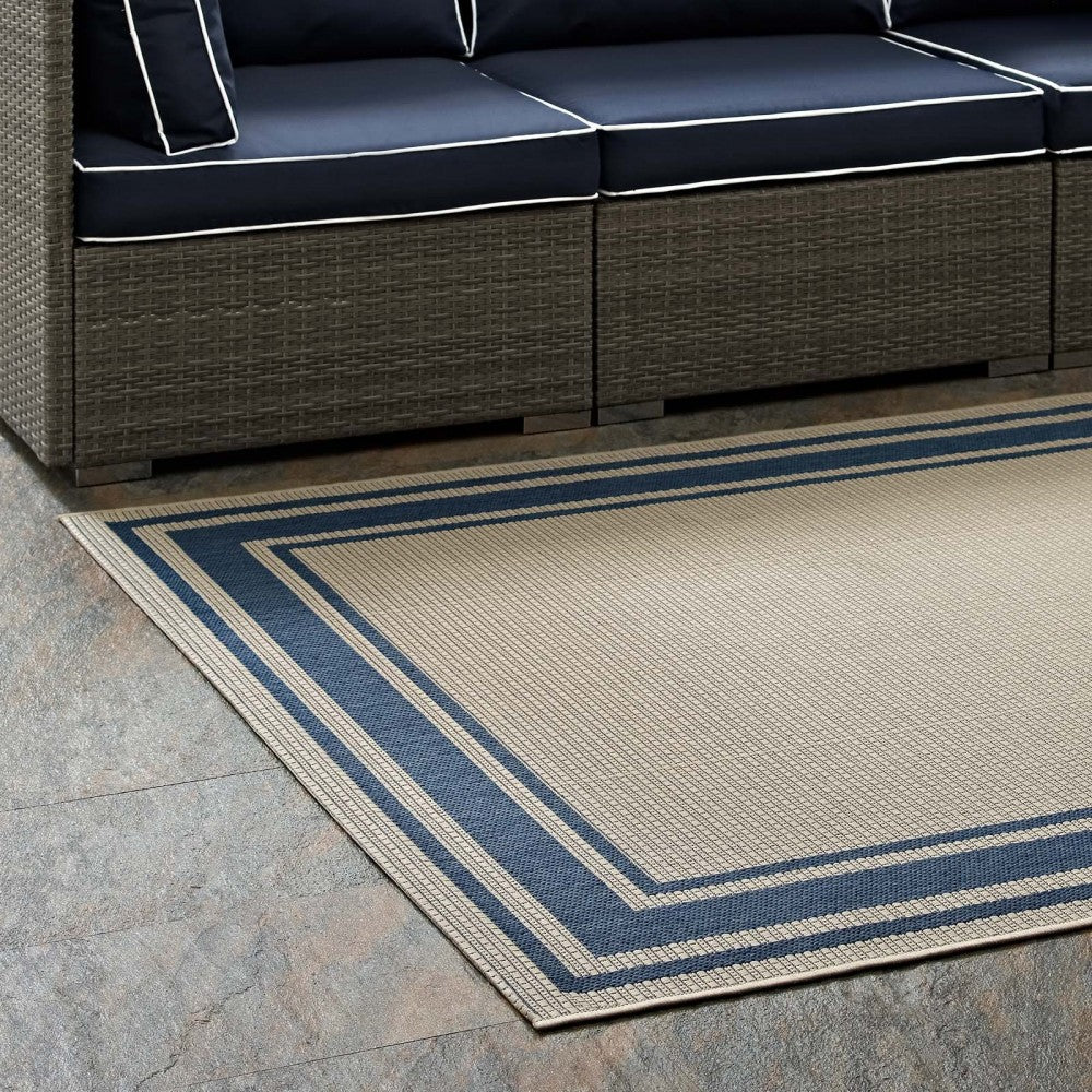 Rim Solid Border 8x10 Indoor and Outdoor Area Rug, Blue and Beige