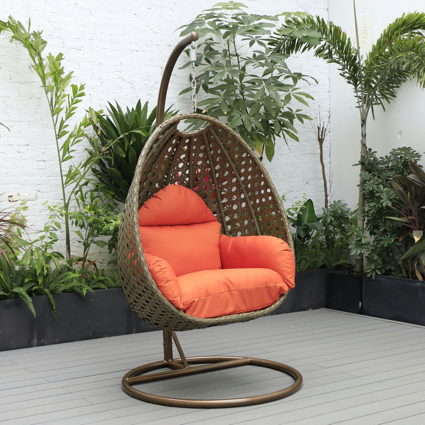 LeisureMod Beige And Orange Wicker Hanging Egg Swing Chair