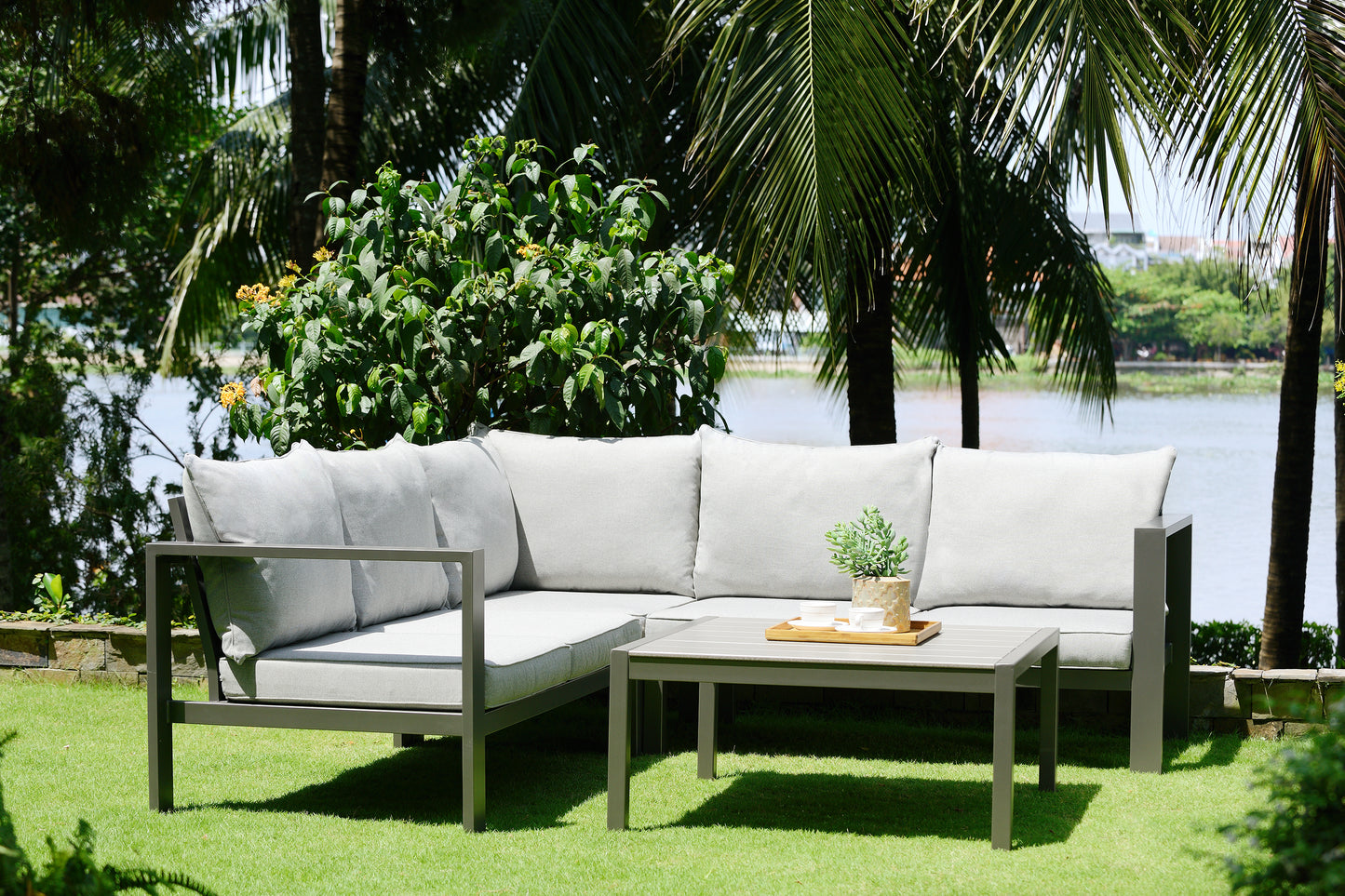Solana Sectional Set in Cosmos Finish with Grey Cushions and Coffee Table