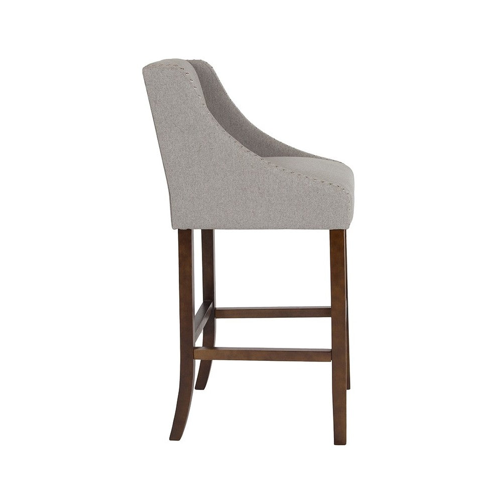 Carmel Series 30" High Transitional Walnut Barstool with Accent Nail Trim in Light Gray Fabric