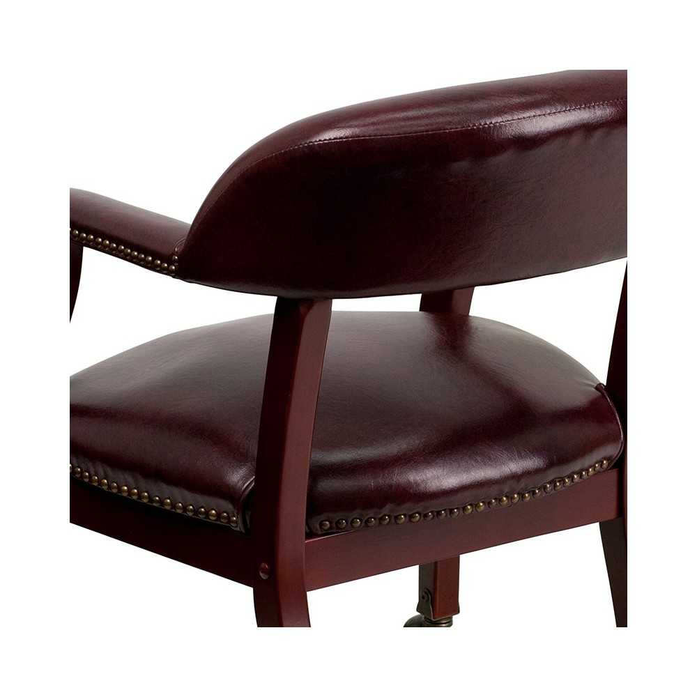 Oxblood Vinyl Luxurious Conference Chair with Accent Nail Trim and Casters