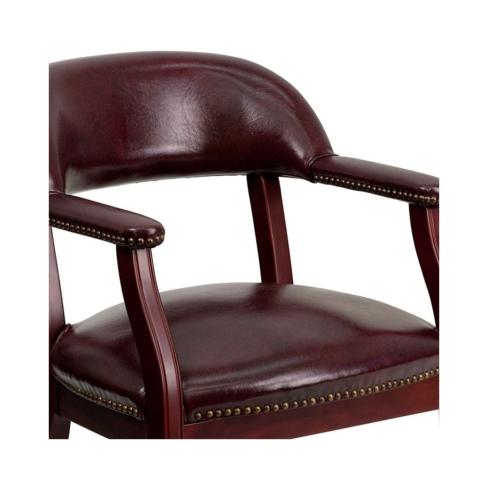Oxblood Vinyl Luxurious Conference Chair with Accent Nail Trim and Casters