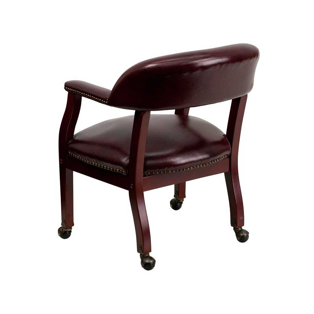 Oxblood Vinyl Luxurious Conference Chair with Accent Nail Trim and Casters