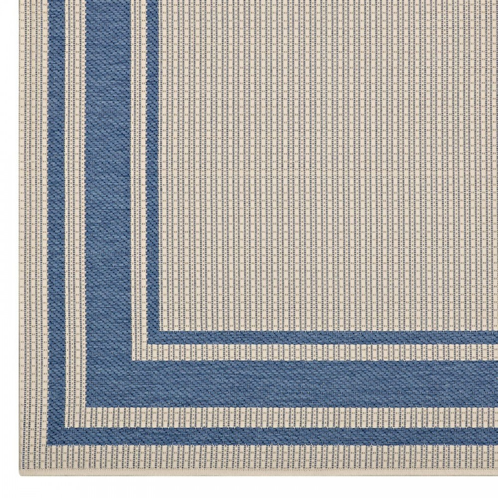 Rim Solid Border 8x10 Indoor and Outdoor Area Rug, Blue and Beige