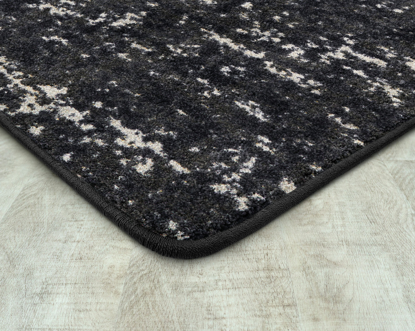 Stretched Thin 7'8" x 10'9" area rug in color Onyx