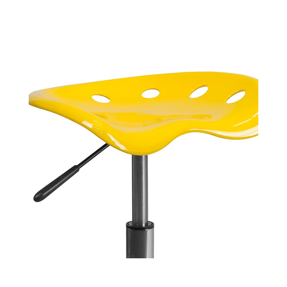 Vibrant Yellow Tractor Seat and Chrome Stool