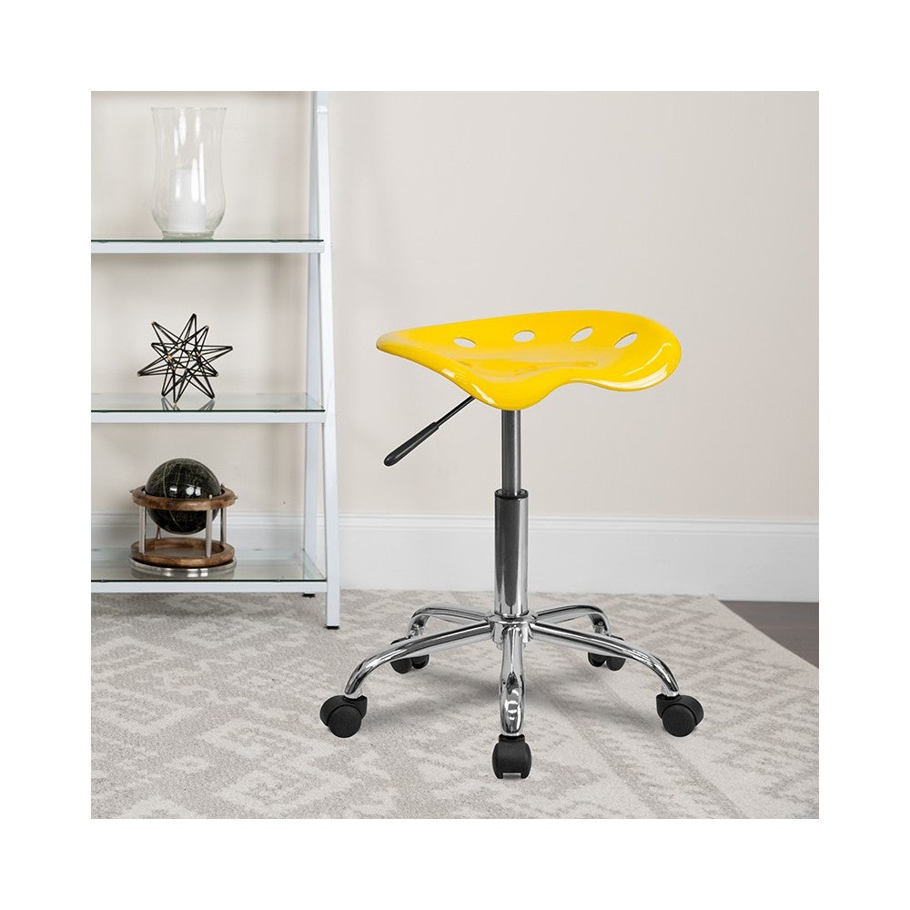 Vibrant Yellow Tractor Seat and Chrome Stool